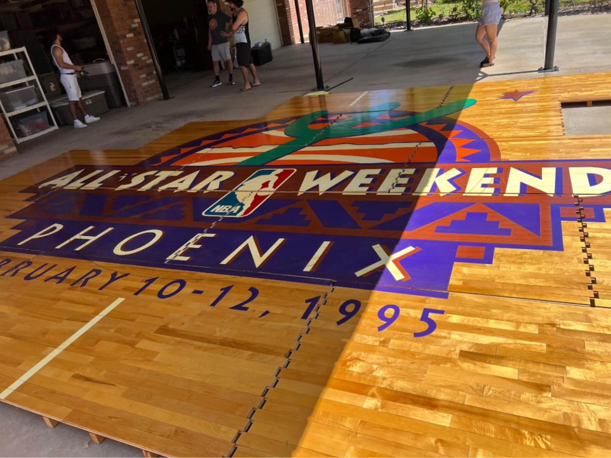 the center logo of the 1995 NBA all-star game on hardwood