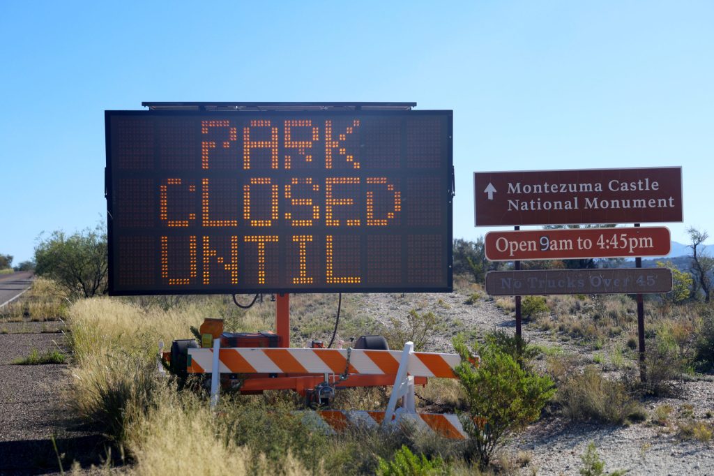 An electronic sign announcing a park closure.