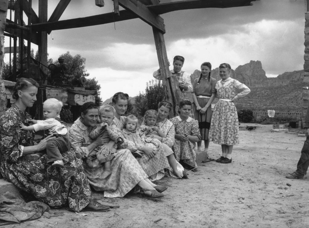 a black and white photo of FLDS women and girls in 1953