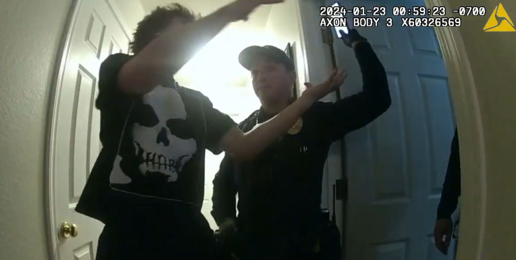 body-cam footage showing a police officer taking a phone from a teenager 