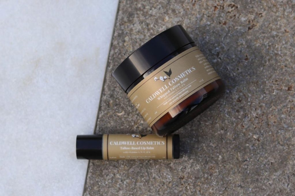 Lip balm and a small jar of lotion.