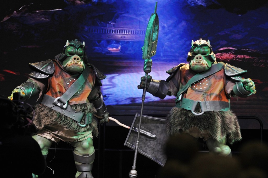 A pair of people dressed as Gamorean Guards from Star Wars.