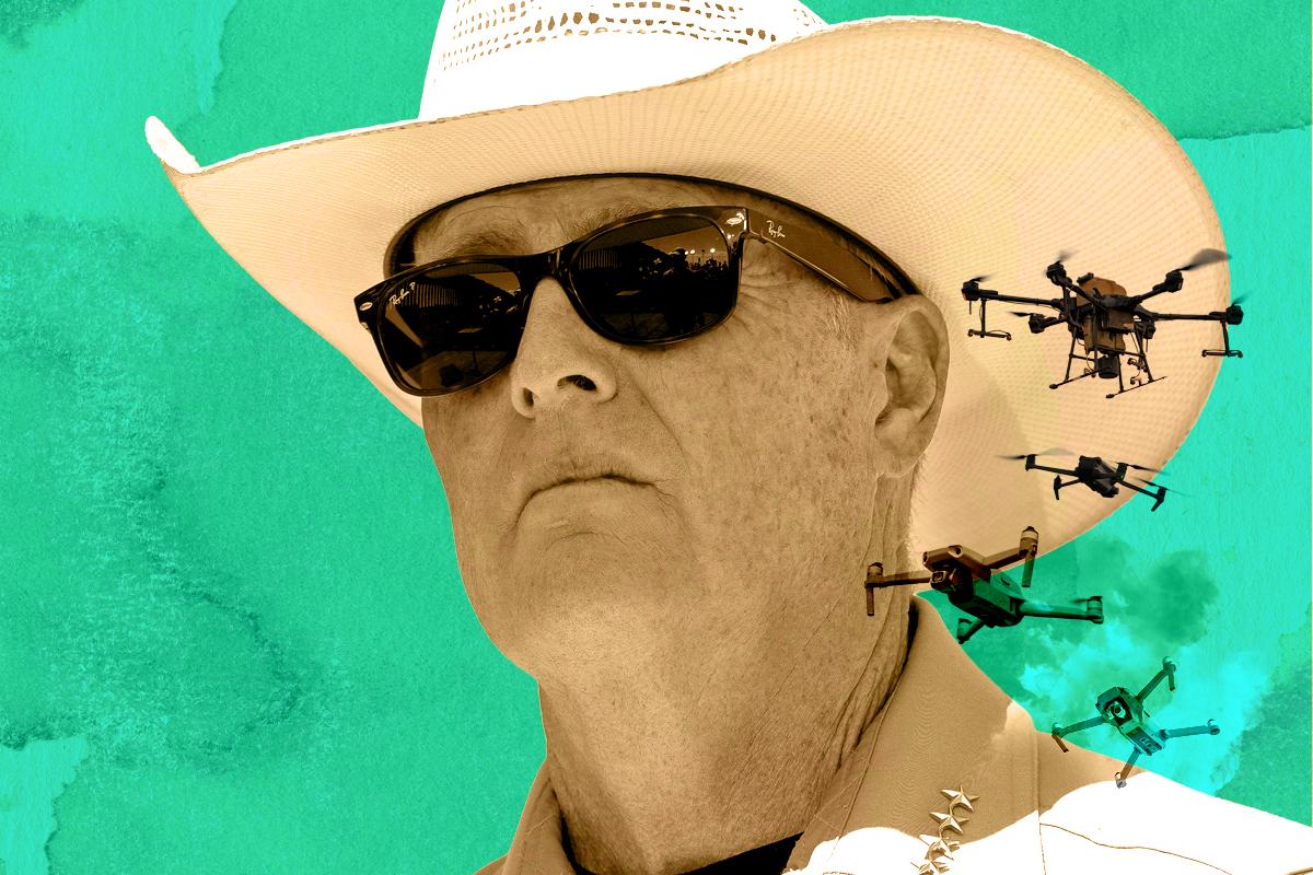a sheriff in a cowboy hat and rayban sunglasses