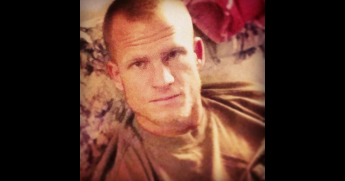 a man with a shaved head