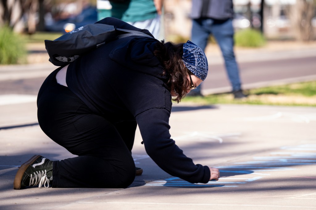 protesters at an anti-ice rally
