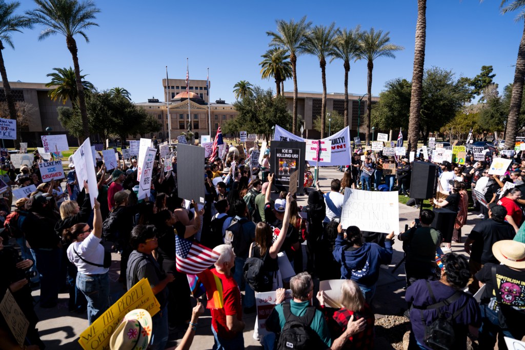 protesters at an anti-ice rally