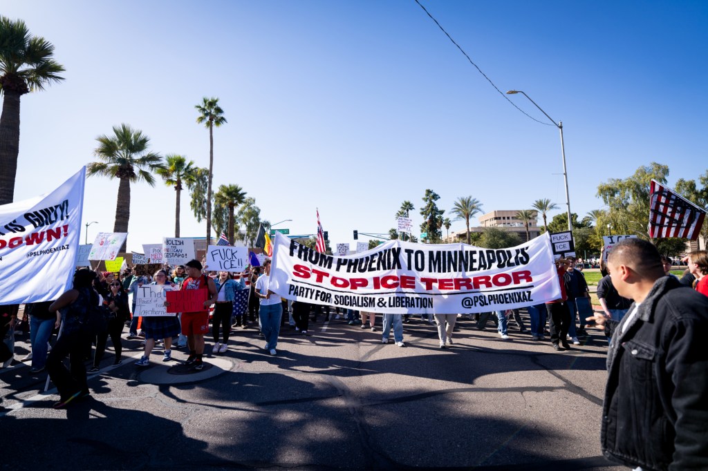 protesters at an anti-ice rally