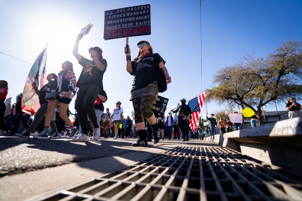 protesters at an anti-ice rally