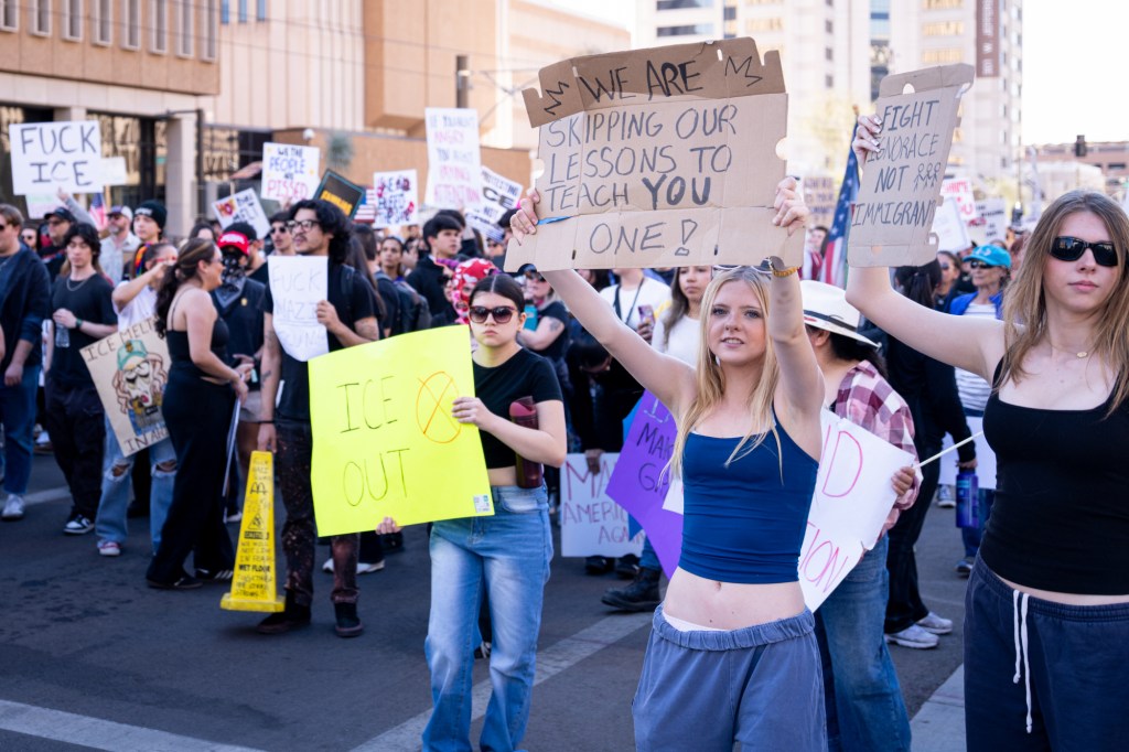 protesters at an anti-ice rally