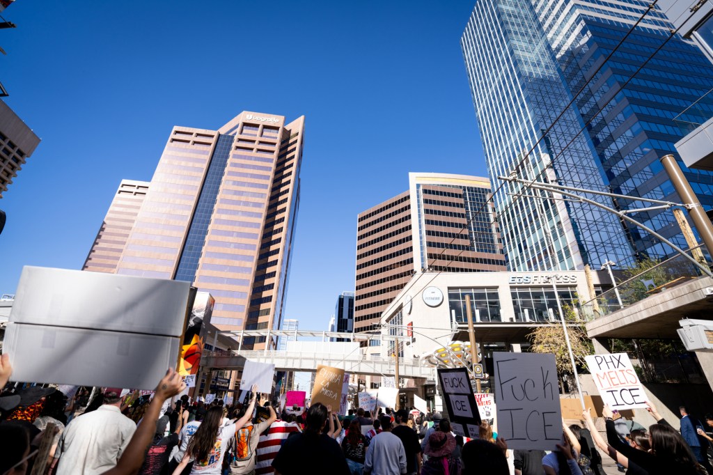 protesters at an anti-ice rally
