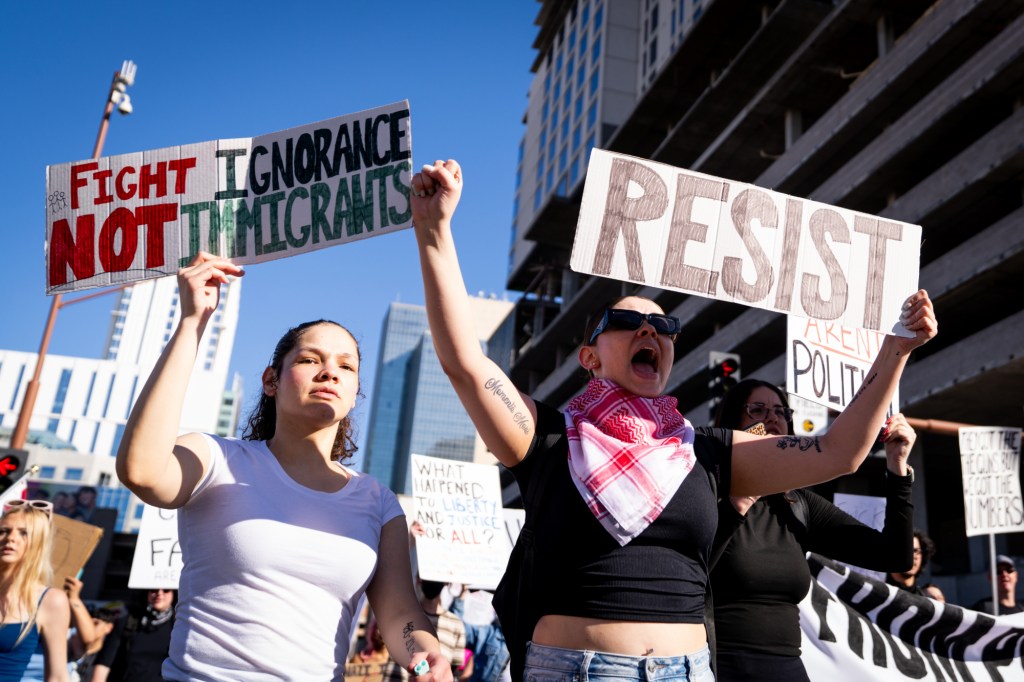 protesters at an anti-ice rally