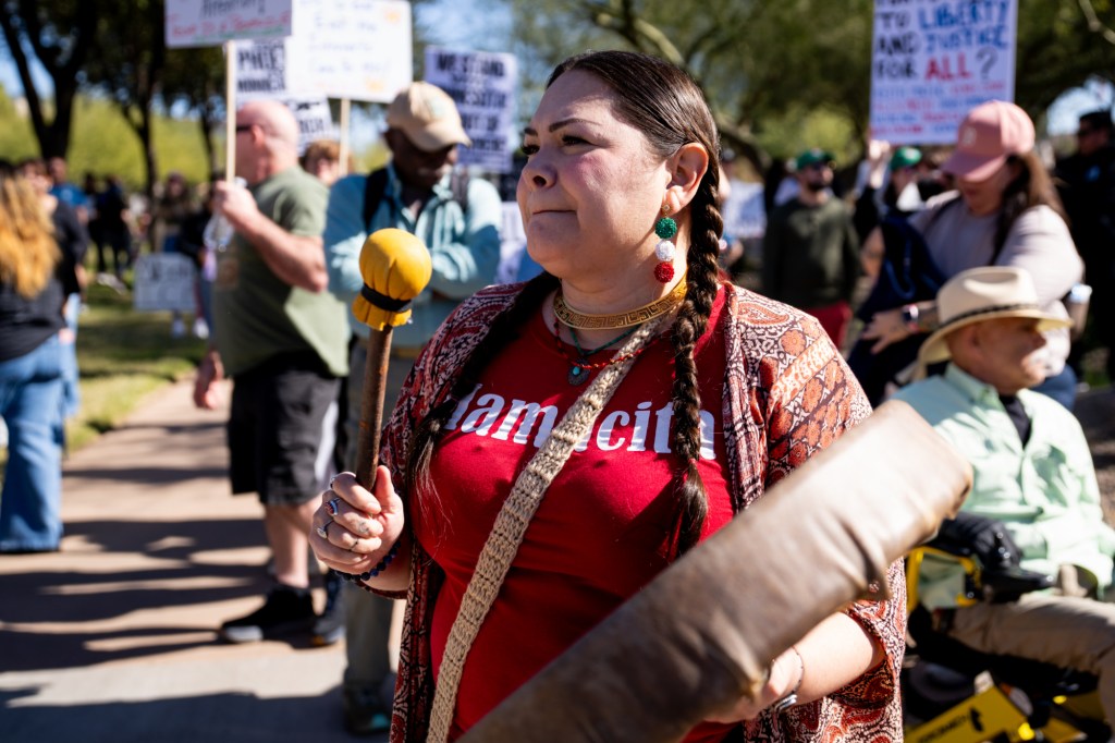 protesters at an anti-ice rally