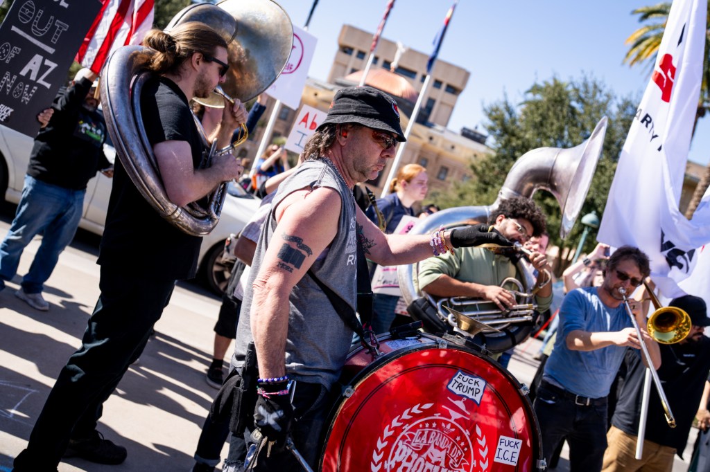 protesters at an anti-ice rally