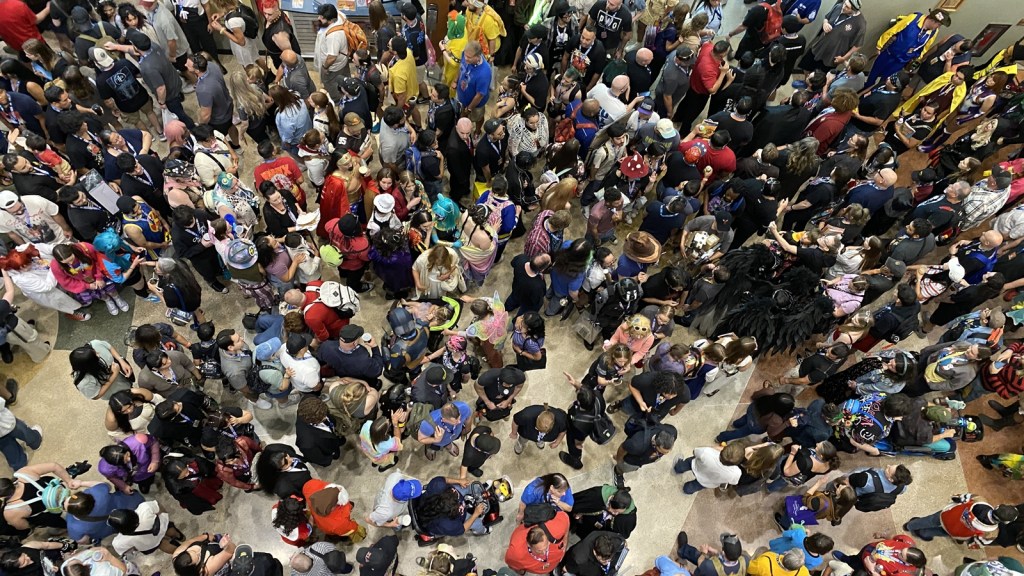 Overhead view of crowds moving through Phoenix Fan Fusion at the Phoenix Convention Center.