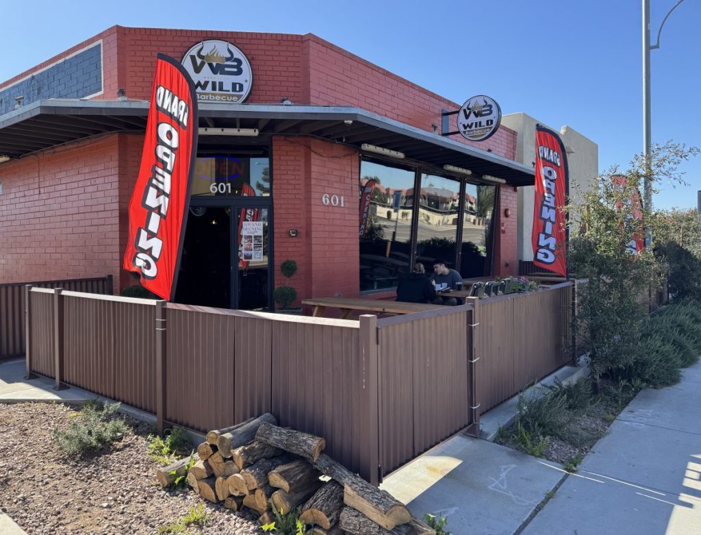 Exterior of a restaurant and its patio.