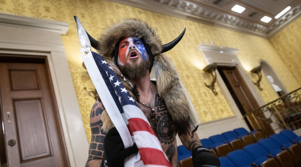 the qanon shaham in full headdress