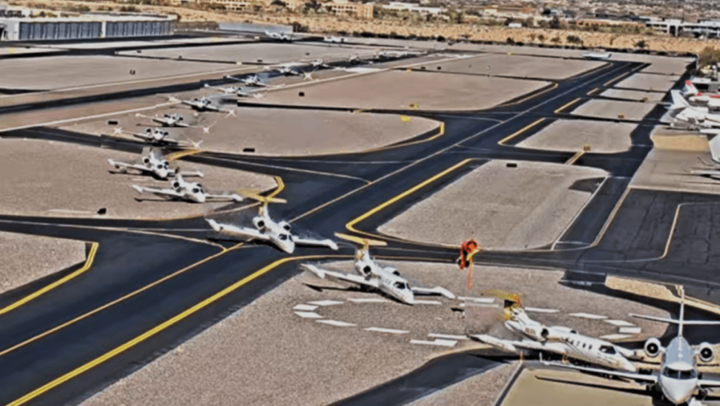 a timelapse photo showing a plane veering off a runway into another jet