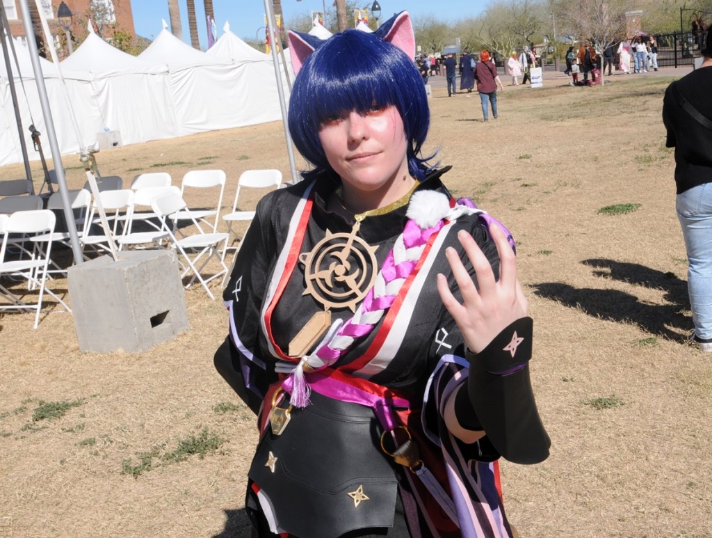 A female cosplayer dressed as Wanderer from the video game “Genshin Impact" at Arizona Matsuri 2026 in Phoenix.