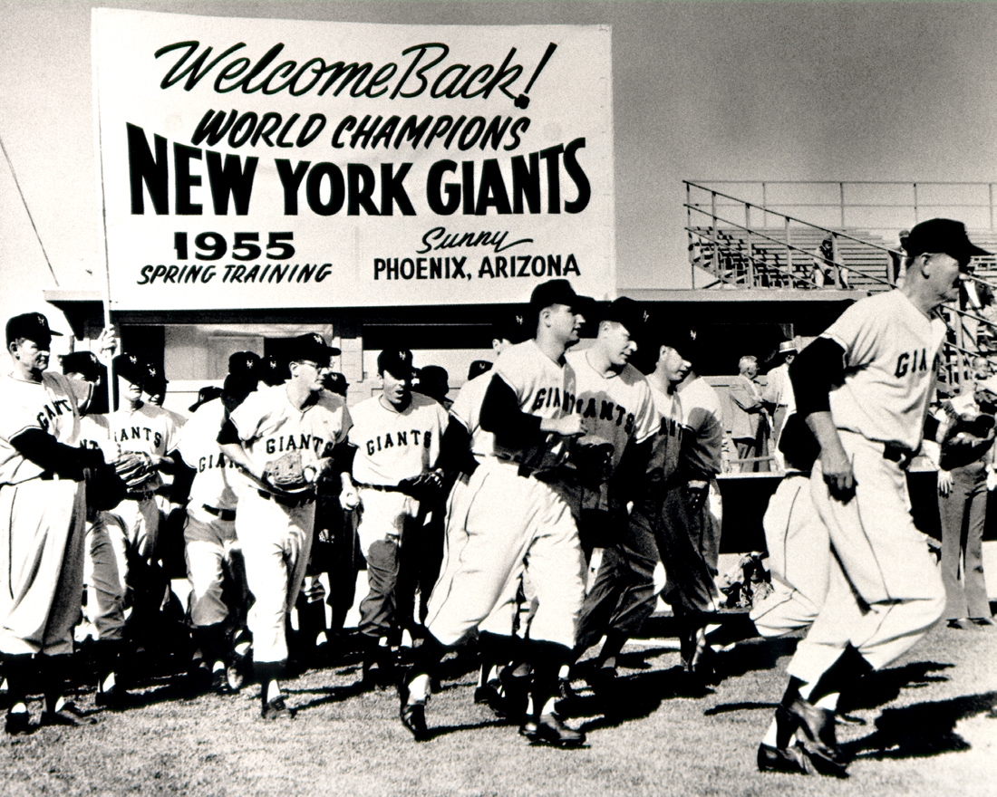 Baseball players take the field at Scottsdale Stadium in 1955.