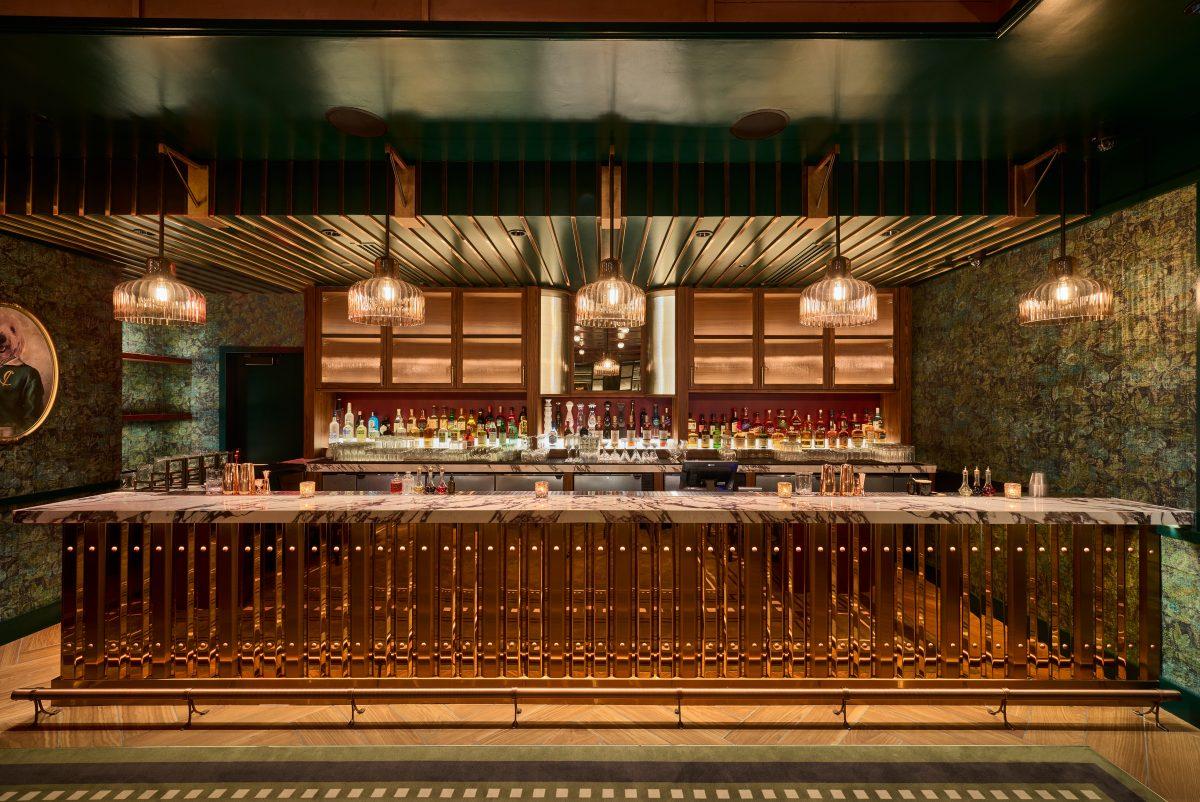 The view of the bar inside The Emerald Lounge at Catch.