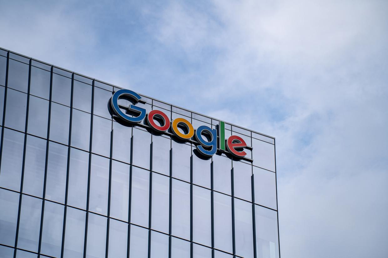 the google logo on the top of a skyscraper