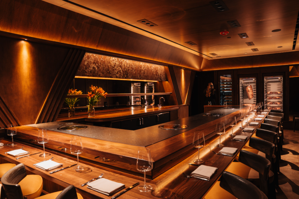 The interior of Uppercut, complete with a central bar and place settings.