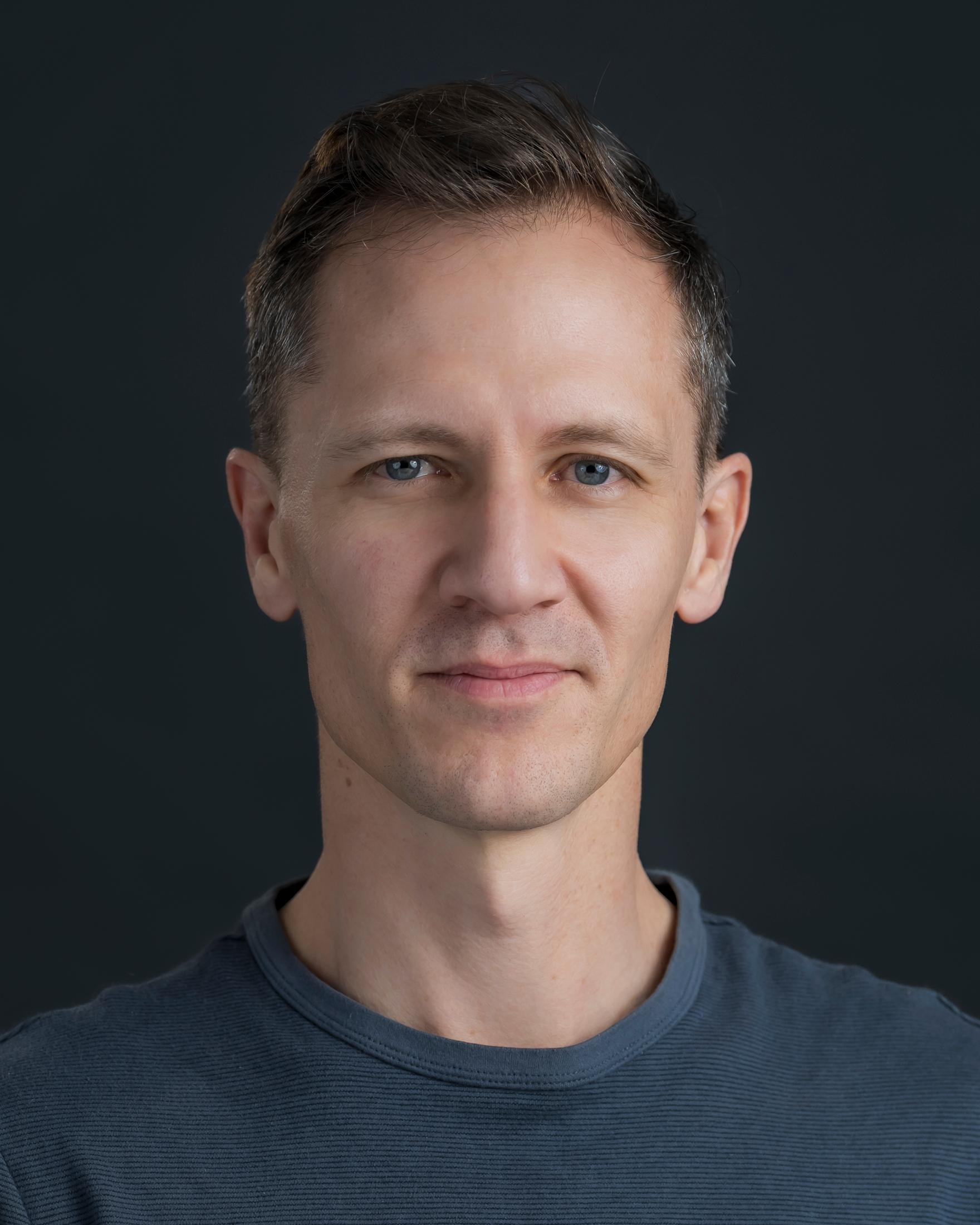 headshot of John Washington