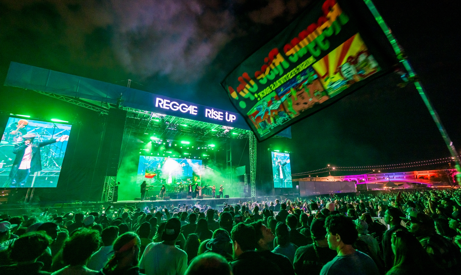 Crowd watches a live performance at Reggae Rise Up Arizona at Tempe Beach Park in Tempe