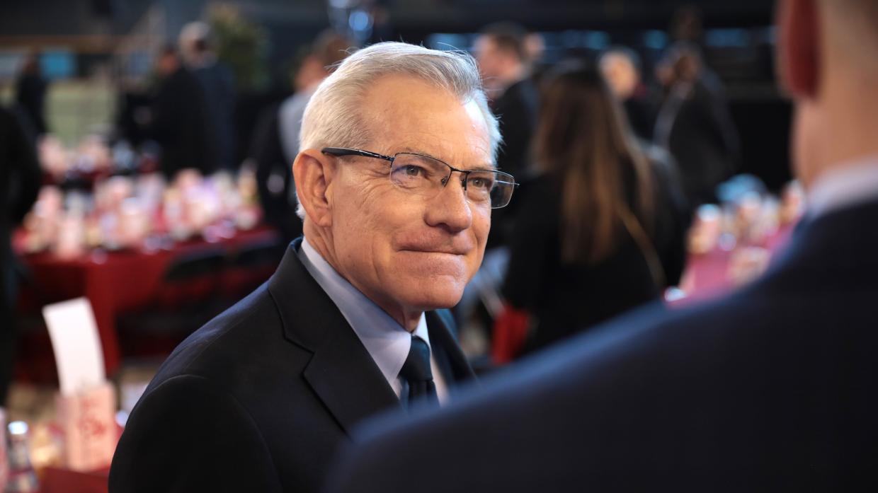 david schweikert wearing glasses and a suit