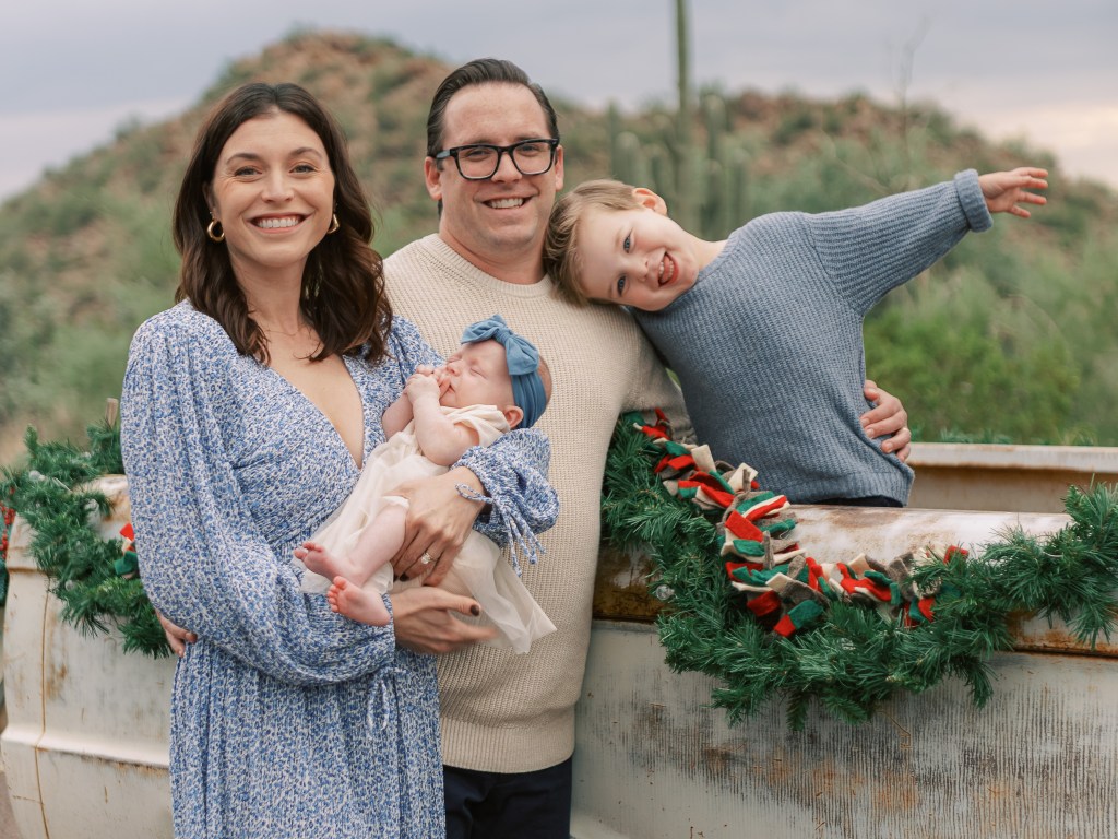 The Carli family poses for a photo in the desert.