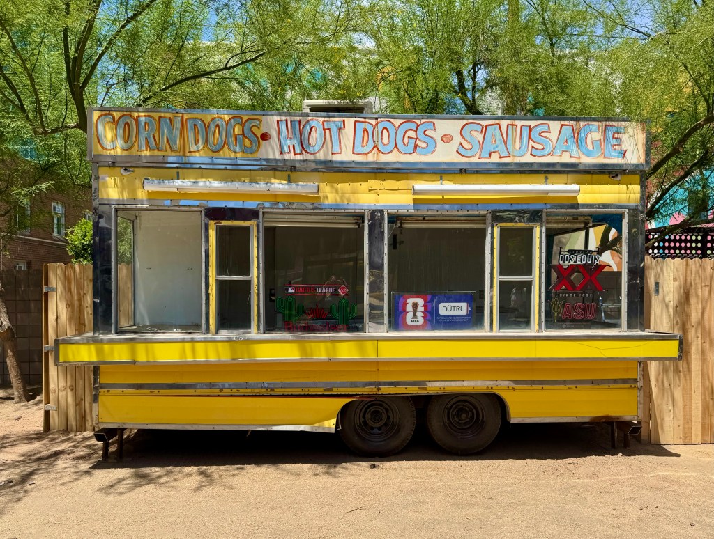 An empty food trailer on the patio of Pinky's.
