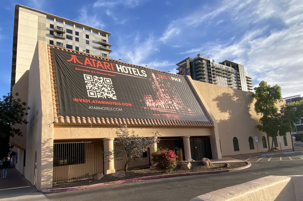 Large Atari Hotel banner covers the former KOY Building in downtown Phoenix, longtime home to Valley radio stations including KOY, KOOL and KMLE.