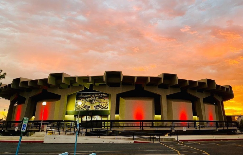 Celebrity Theatre in Phoenix at sunset. The historic round venue is hosting concerts by Rick Ross, Chris Isaak, Art Garfunkel and other artists in 2026.