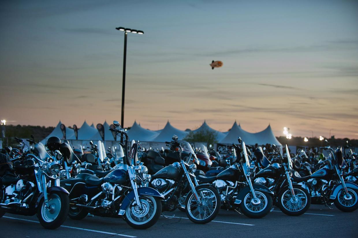 Dozens of motorcycles parked at Arizona Bike Week in Scottsdale.