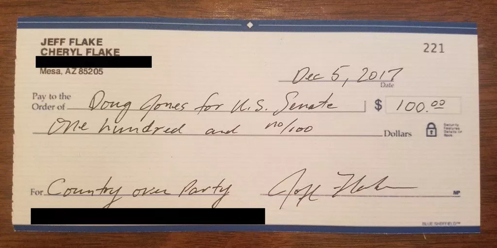 Jeff Flake Sends $100 to Doug Jones, Roy Moore’s Opponent in Alabama Senate Race