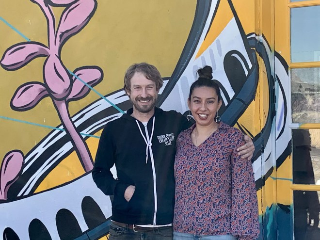 two people pose for a picture