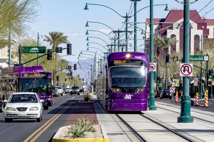 Valley Metro Rail stops at a station.