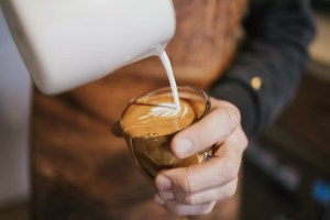 Milk poured into espresso at Case Study.