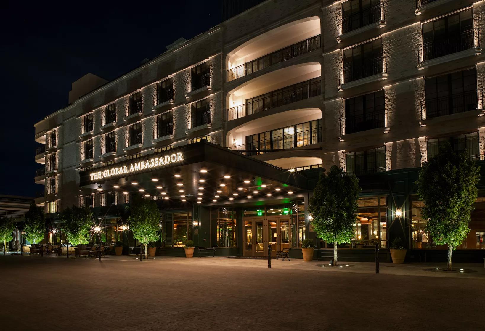 The Global Ambassador exterior at night.