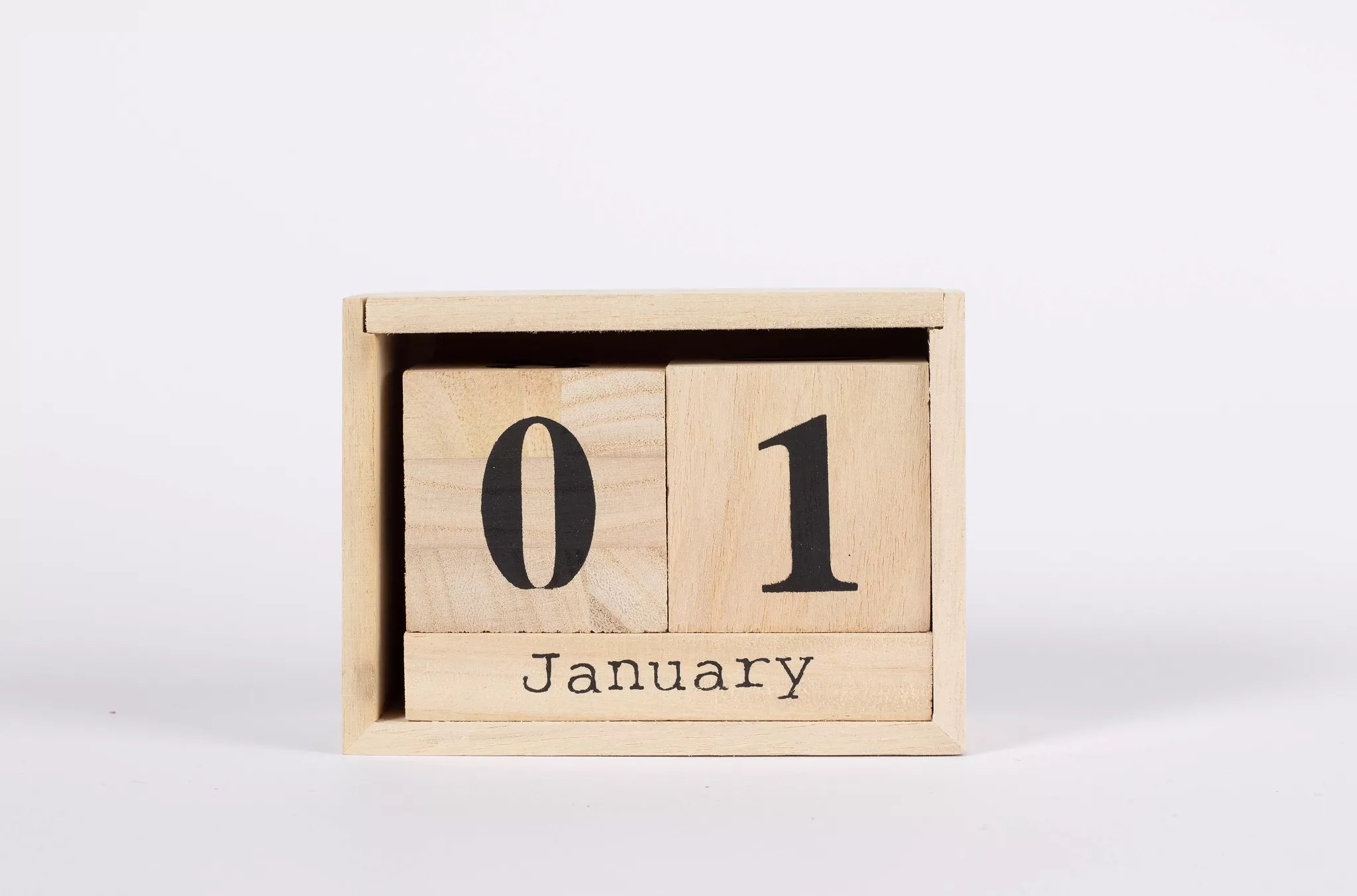 Wooden calendar blocks set to Jan. 1.