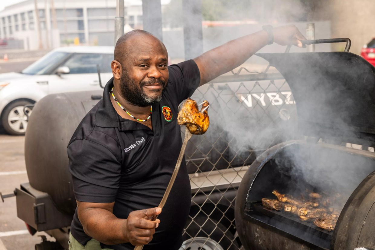 Cool Vybz chef grills chicken.