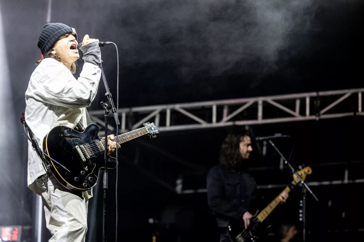 A man performs onstage.