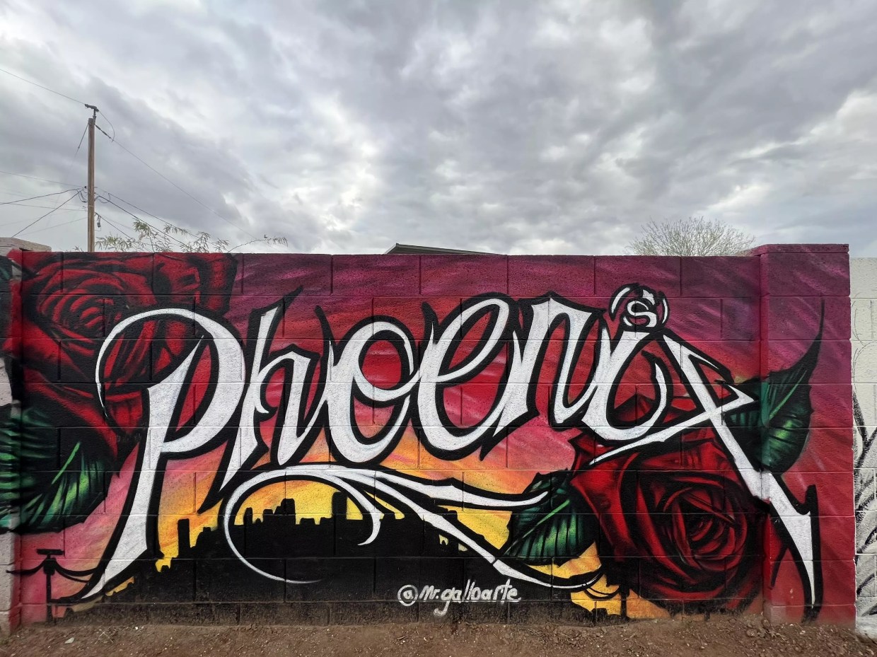 Artists and attendees got colorful at Phoenix’s Oak Street Alley Mural Festival
