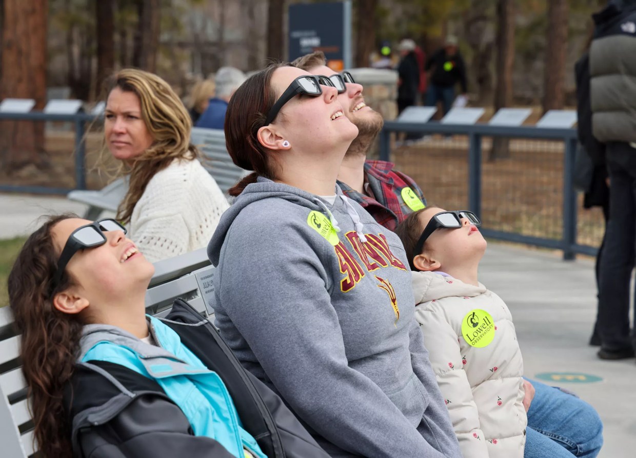 Despite cloud cover, solar eclipse delivers for Flagstaff skywatchers