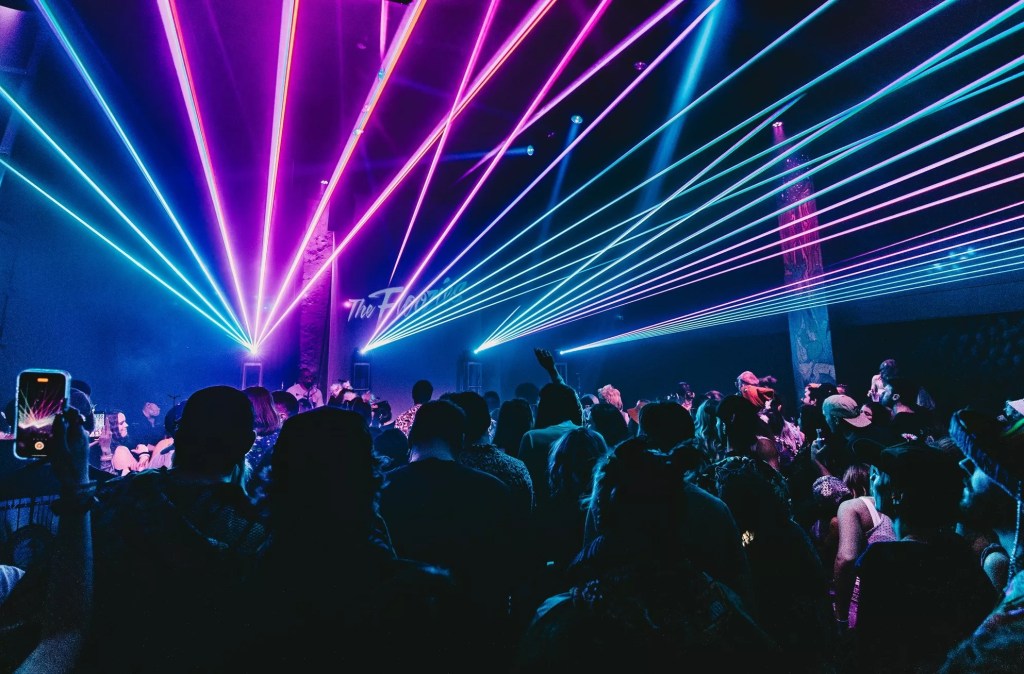 Lasers shine over the dance floor at Tempe nightclub Darkstar Theater during an EDM show.