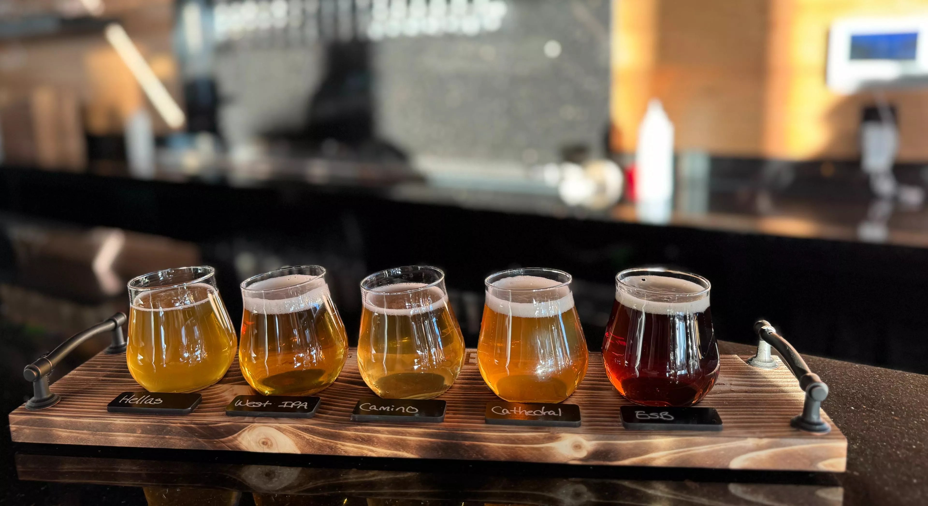 A flight of beer samples.