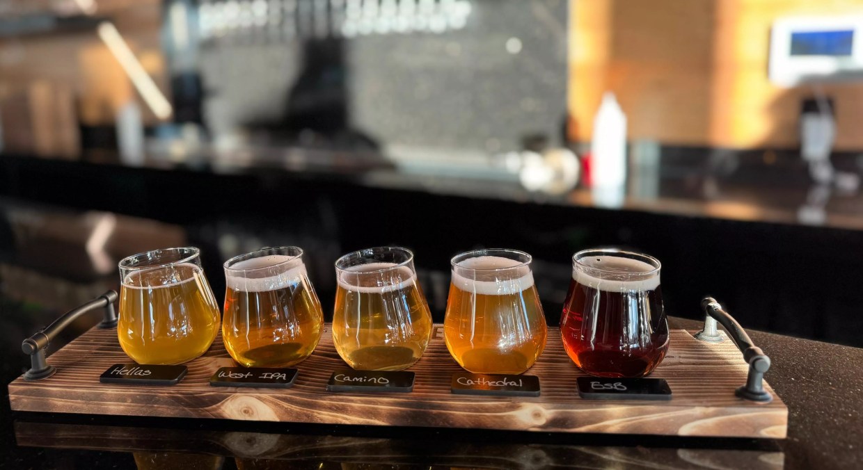 A flight of beer samples.