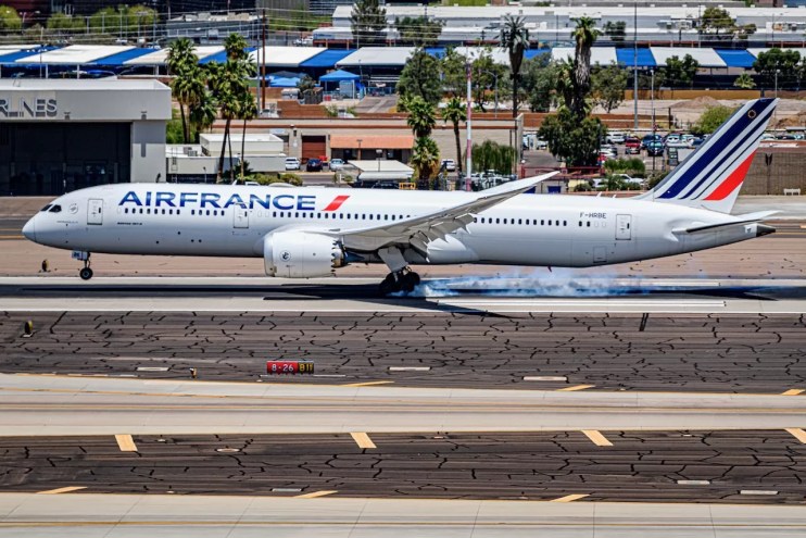 An Air France jet skids to a stop on a runway