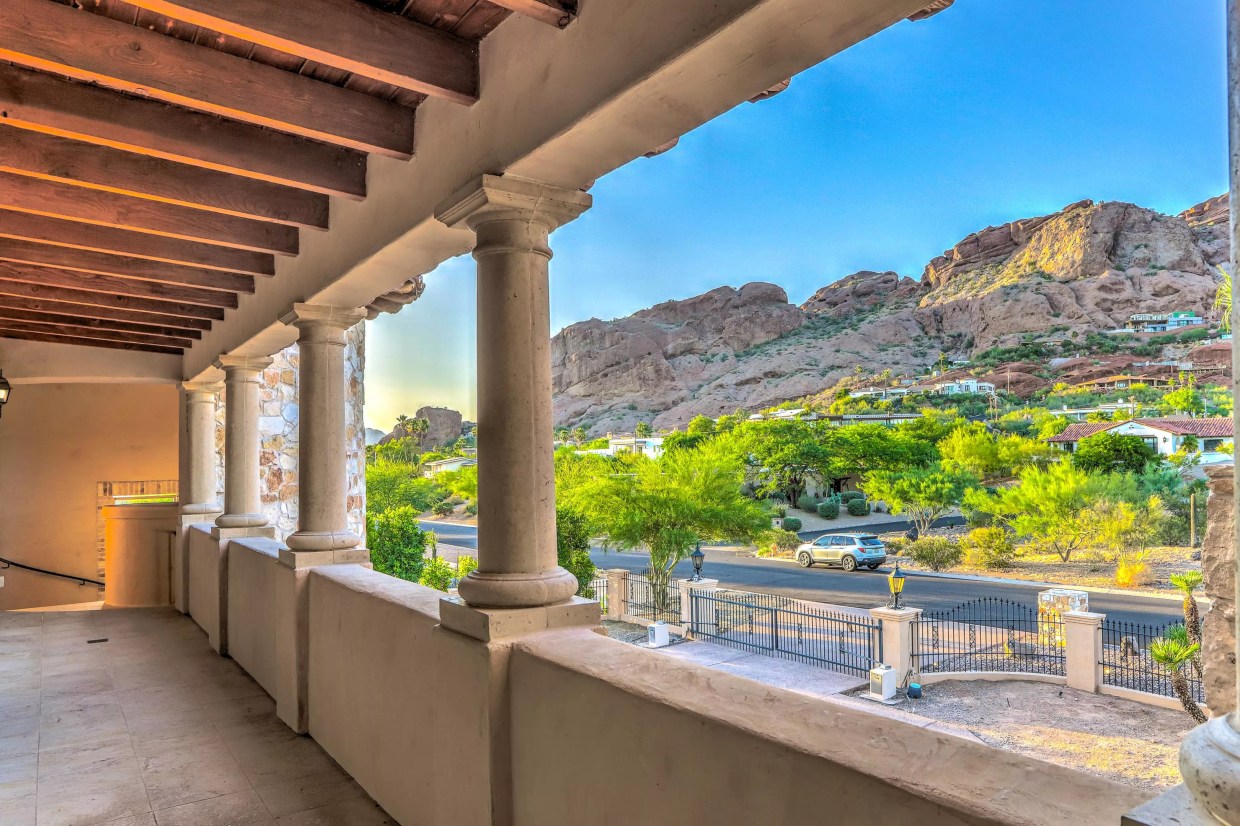 A balcony at a mansion.