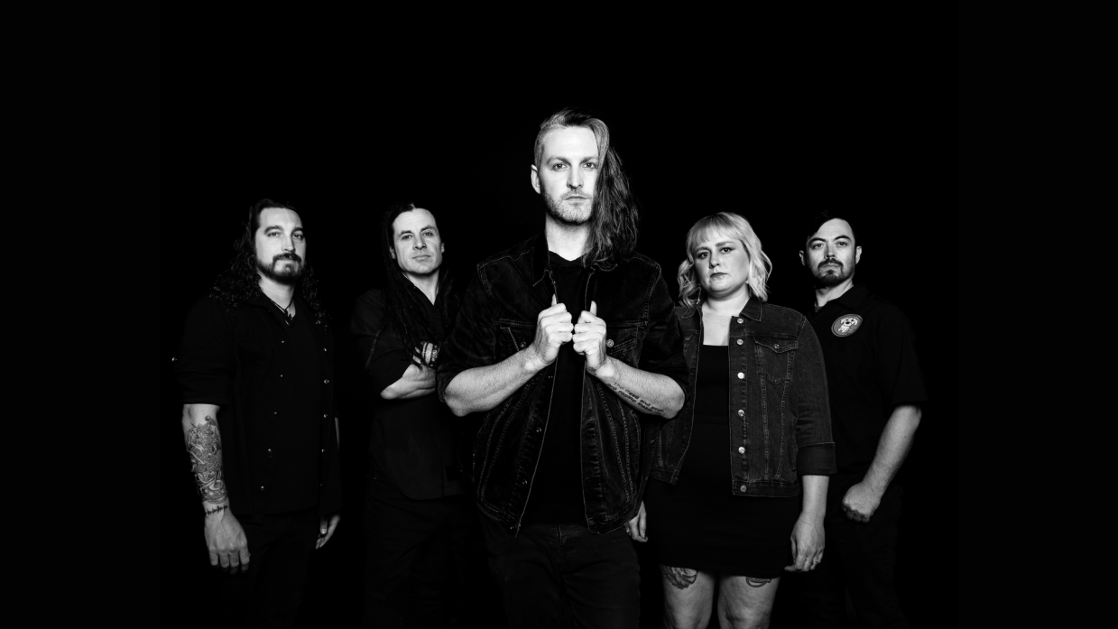 A rock band in black and white.